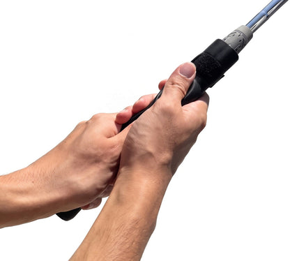 Hands holding a golf club with the Perfect Grip Attachment fitted