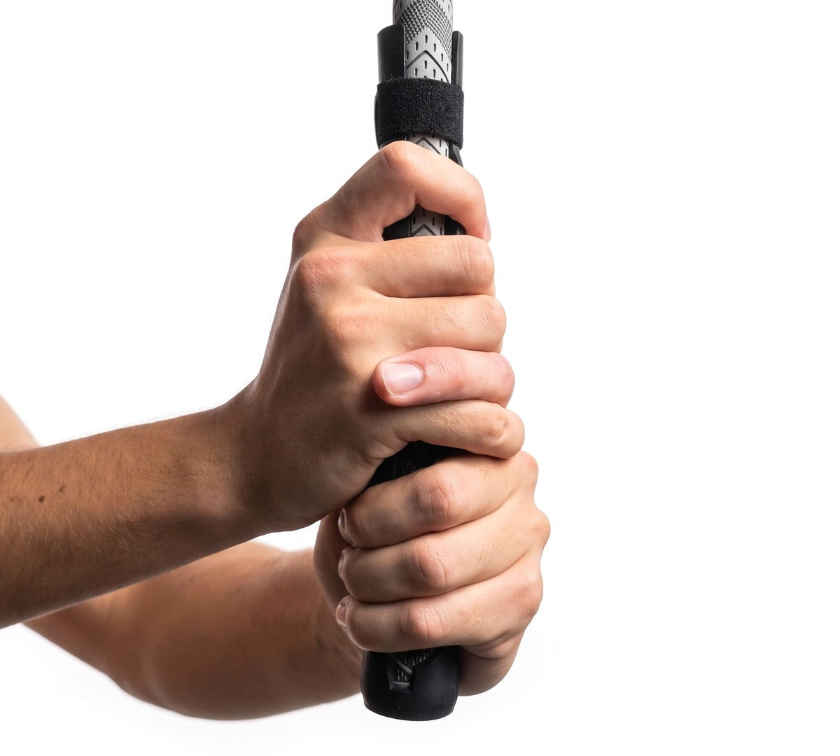 Golfer gripping a club fitted with the Perfect Grip Attachment