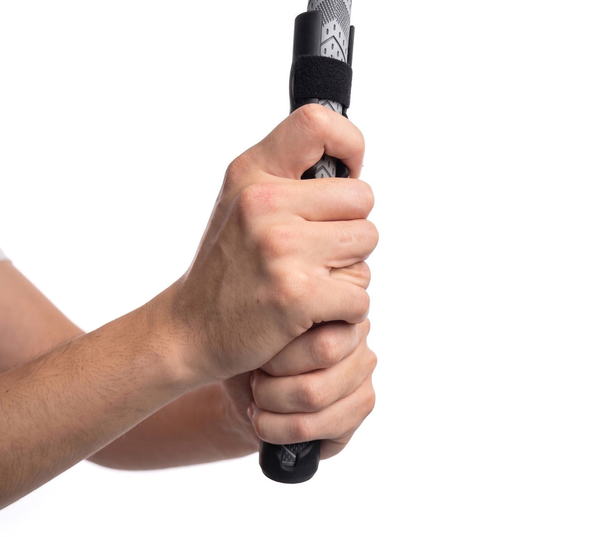 Close-up of two hands holding a golf club with the Perfect Grip Attachment fitted